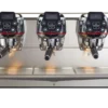 La Cimbali M200 espresso machine with three brewing heads, advanced control panels, and steam wands, designed for commercial use